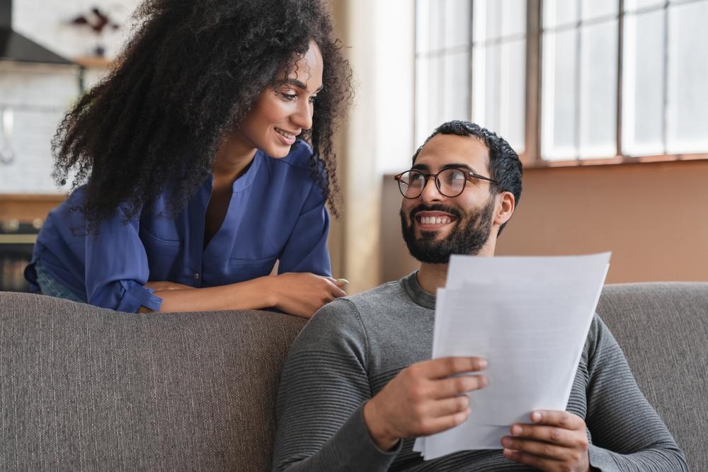 couple deciding the best way to minimize taxes