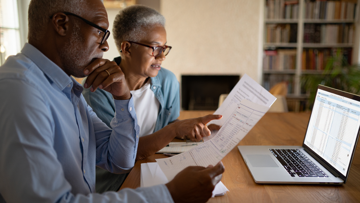 Senior Couple Reviewing Financial Documents